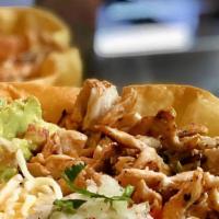 Carnitas Taco Bowl Salad · Crispy Flour Tortilla in shape of a bowl with romaine lettuce, mozzarella cheese, pico de ga...