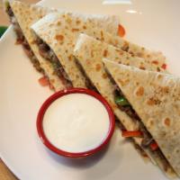 Cheese Quesadilla · Flour tortilla grilled with Mozzarella cheese and pico de gallo inside. With a side of sour ...