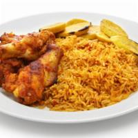 Grilled Chicken & Rice · Grilled chicken marinated to perfection, served over a steaming bed of rice, a side of veggi...
