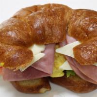 Croissant Sandwich · Ham, scrambled egg, cheese, tomato and lettuce.