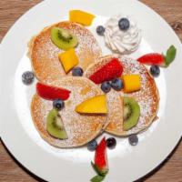 Fresh Fruit Party Pancake · Vanilla ice cream, seasonal fruits and strawberry jam.