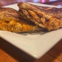 Buffalo Chicken Grilled Cheese · Shredded chicken breast drenched in Blazing Hot Buffalo sauce & Sriracha grilled with Chedda...