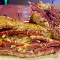 Grilled Corned Beef & Swiss On Rye · Corned Beef & Swiss Cheese on Grilled Rye w/ Sauerkraut & Thousand Island