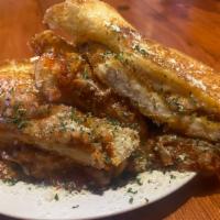 Chicken Parm Grilled Cheese · A premium breaded chicken cutlet smothered in marinara with parmesan and mozzarella grilled ...