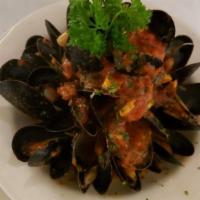 Mussels/Cozze · Mussels with white wine or tomato sauce.