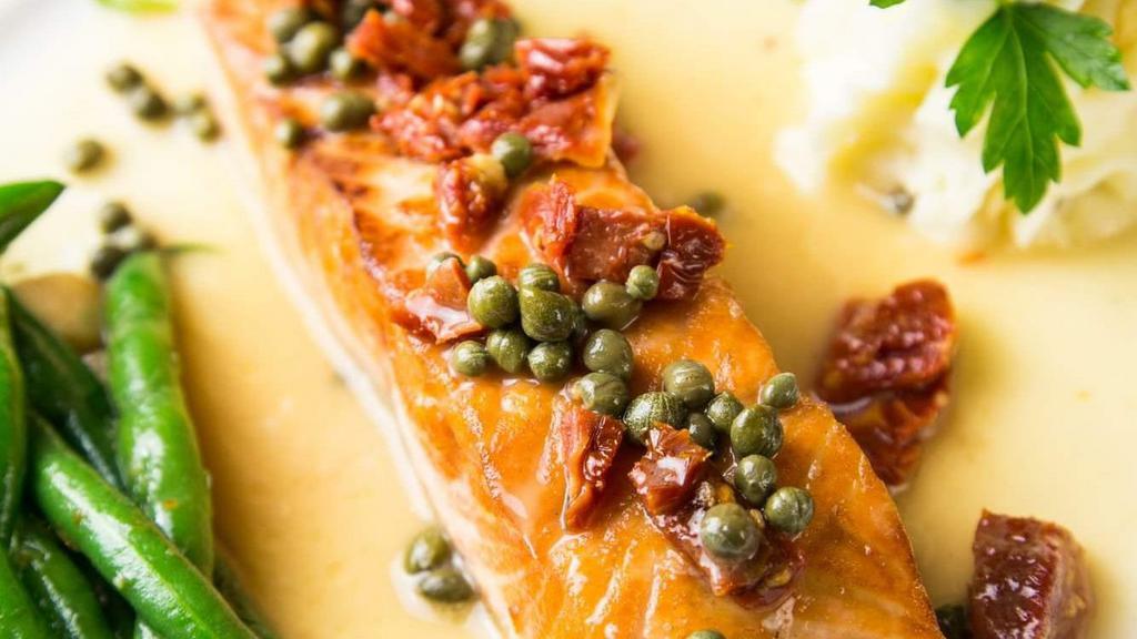 Salmon With Capers/Salmone Con Capperi · Fresh broiled salmon with sun-dried tomato white wine and capers sauce.