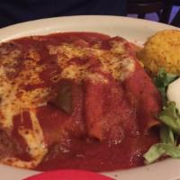 Enchiladas Rancheras · Two corn tortillas stuffed with ground beef, shredded chicken or cheese topped with ranchera...