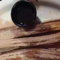 Churros · served with nutella.