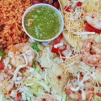 Shrimp Taco/  Tacos De Camaron · Three shrimp taco choice of flour or corn tortilla, lettuce, and a special sauce.
Served wit...