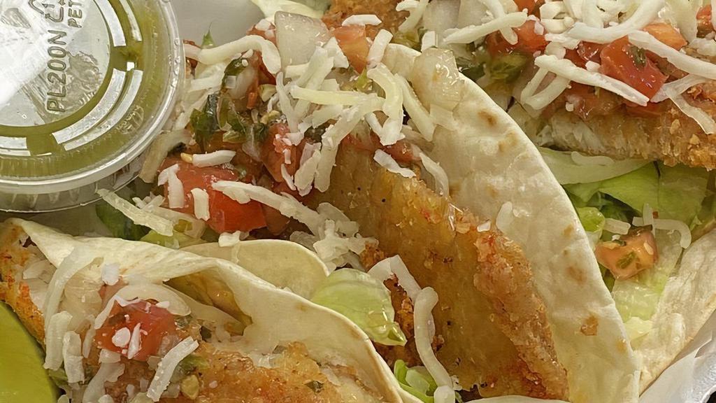 Tilapia Tacos/ Tacos De Tilapia · Choice of flour tortilla or corn tortilla. Grilled tilapia season with Layla's spices and a special sauce served with lettuce.
 Includes rice, beans.