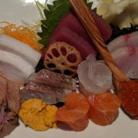 Sashimi Deluxe · Chef's selection of prepared raw fish and shellfish.