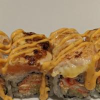 Tiger · Spicy kani, tempura flakes, cucumber, topped with seared salmon and Japanese mayo.