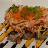 Kubo · Eel tempura roll topped with spicy kani salad.