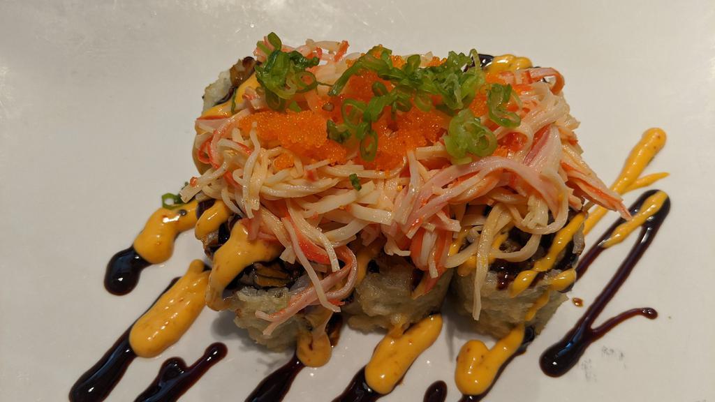 Kubo · Eel tempura roll topped with spicy kani salad.