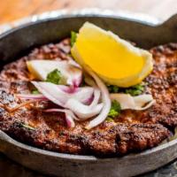 Tunde Ka Kabab · Minced lamb kebabs with Indian spices that melt in your mouth