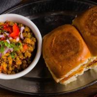 Lamb Keema Pav · Wok tossed minced lamb with green chilies and spices with pav bun