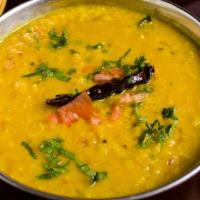Tadka Dal · Yellow Lentils Tempered with Cumin and Green Chilies.