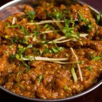 Baigan Bharta · Tandoor Smoked Eggplant with Roasted Spices with Garden Herbs.