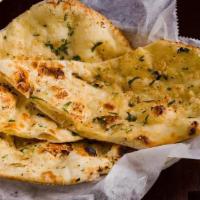 Garlic Naan · Tandoor fired white flour garlic bread