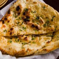 Chili Dhaniya Naan · Tandoor fired white flour bread with chili and cilantro