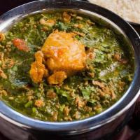 Murg Saag · Curried chicken cooked with pureed spinach
