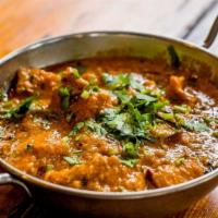 Goan Fish Curry · Tamarind, coconut, and curry leaves.