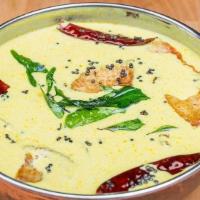 Kotayam Moilee · Fish, turmeric infused coconut milk, and curry leaves.