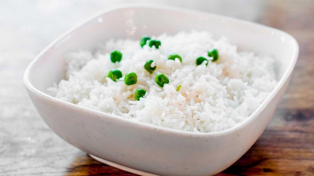 Basmati Rice · Plain basmati rice with green peas