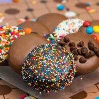 Chocolate Covered Oreos · Pick milk, dark, or white chocolate and their toppings to be plain, sprinkles, M&M's or nonp...
