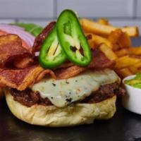 Donjito Burger · Bacon, pepper jack cheese, grilled jalapeños, guacamole, French fries.