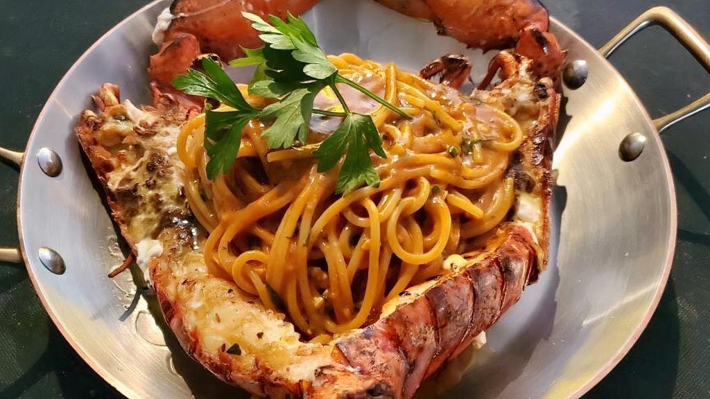 Lobster Fra Diavolo (Serves 2) · Whole Lobster with spaghetti in slightly spicy (bella picante) tomato sauce. For 2.