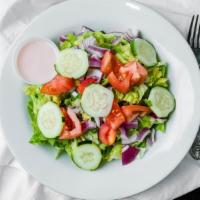 Garden Fresh Salad · Romaine, tomatoes, cucumbers, red onions & our famous homemade dressing