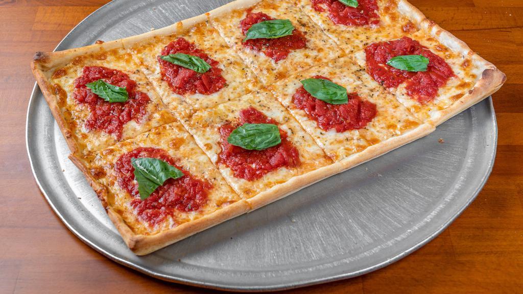 Grandma Pizza · Thin crust sicilian, marinara, mozzarella & fresh basil pie