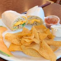Breakfast Burrito · Scrambled eggs, grilled chicken, peppers, onions & cheese wrapped in a grilled flour tortill...