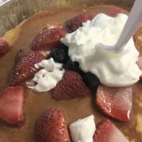 Double Berry Ricotta Pancakes · A stack of tender & sweet ricotta pancakes topped with fresh strawberry & blueberry, dusted ...