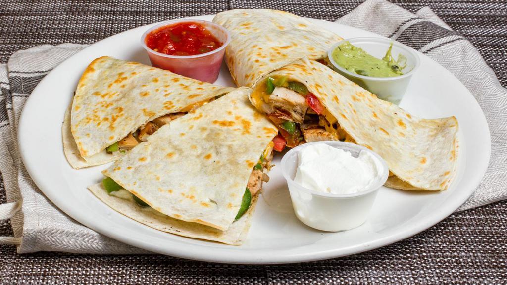 Chicken Quesadillas · Served with guacamole, sour cream and chunky salsa.