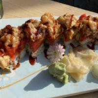 King Kong Roll · Inside: shrimp tempura, spicy tuna, avocado, outside: tempura soft shell crab with eel sauce...