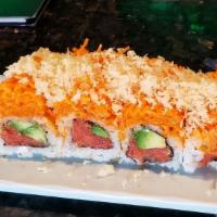 Dynamite · Spicy crunchy tuna inside with spicy kani and crunch on top.