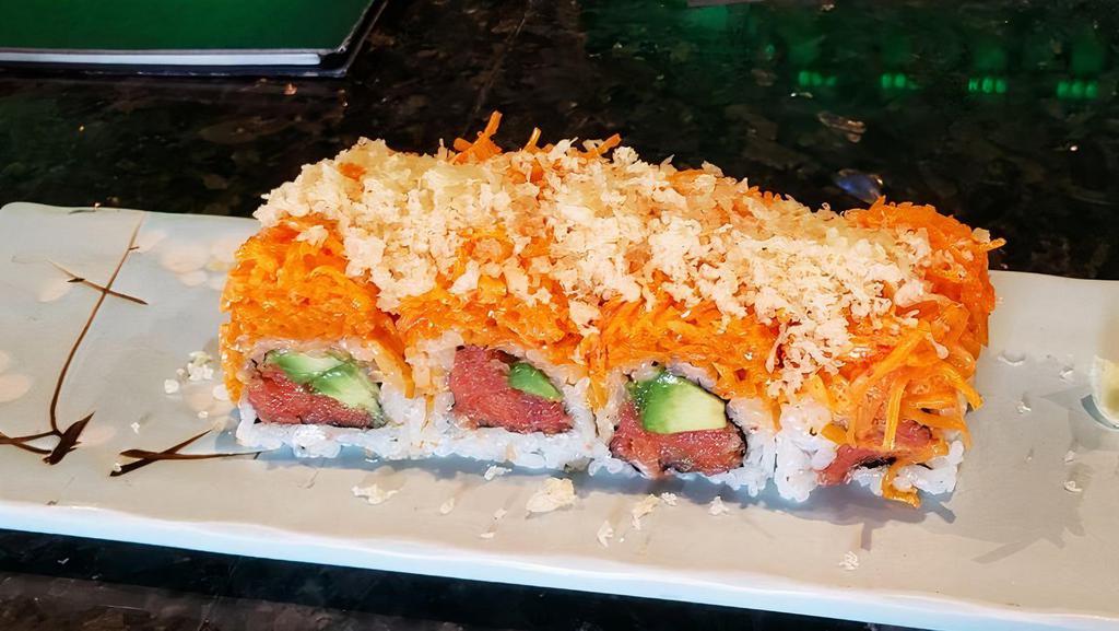 Dynamite · Spicy crunchy tuna inside with spicy kani and crunch on top.