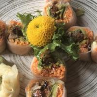 Donald Duck Roll · Inside: spicy crunchy kani, roast duck, avocado, cucumber. Outside: spring roll wrapper & ee...