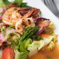 Grilled Shrimp Salad · Little spicy. Grilled shrimp mixed w/ chili paste, lemongrass, kaffir lime leaves, cucumber,...