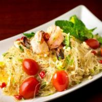 Glass Noodle Salad (Yam Woon Sen) · Little spicy. Vermicelli noodle, shrimp,calamari, minced chicken, tomato, onion, chili, mint...