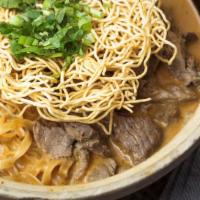 Kao Soi Curry Noodle · Spicy. Egg noodle. w/ choice of beef or chicken in curry sauce, beansprout, red onion topped...