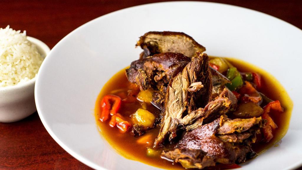 Luscious Duck (Half Duck) · Crispy duck topped w/ pineapple, scallion, bell pepper onion, tomato in sweet & sour sauce.