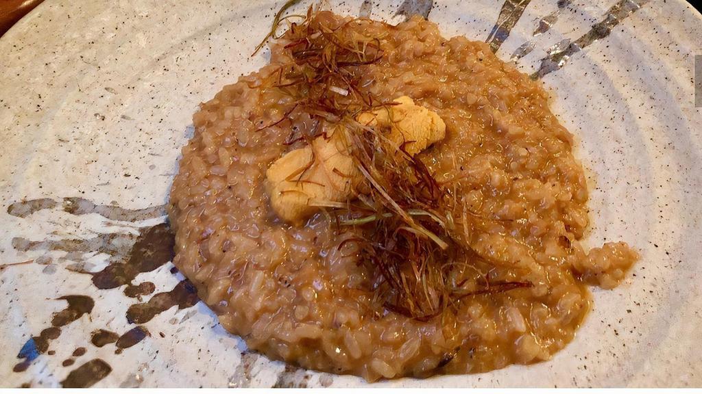 Uni Risotto · Italian rice cooked with mushroom, uni paste and topped with fresh uni.