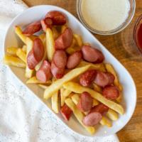 Salchipapas · Bits of hot dog with fries.