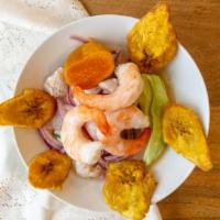 Ceviche Calu Mixto · Diced fish and shrimp, red onions, corn marinated in lime juice served with tostones.