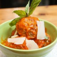 Polpette Al Sugo · Meatballs in tomato sauce.