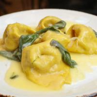 Tortelloni Al Burro E Salvia · Homemade tortellini with spinach and ricotta filling in butter sage sauce.