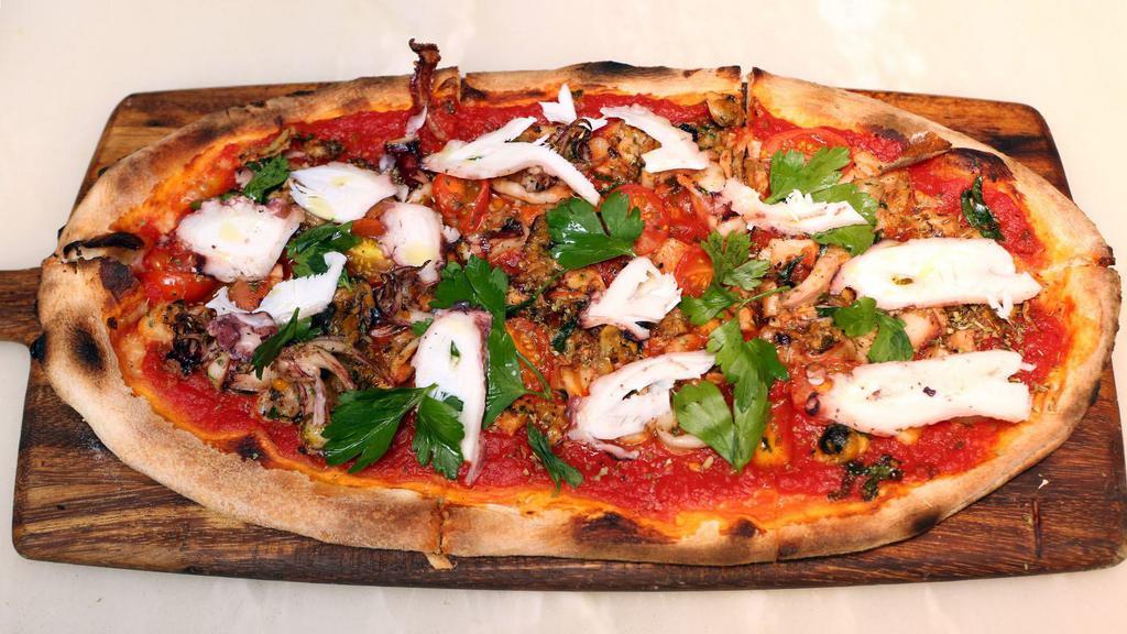 Seafood Pizza · Mussels, clams, octopus, calamari, shrimp, cherry tomato and fresh parsley.